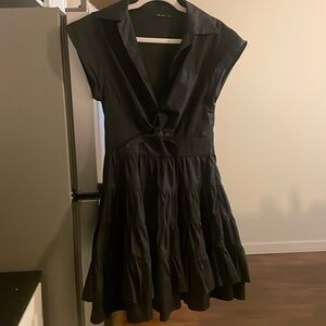 Black midi dress with ruffle bottom